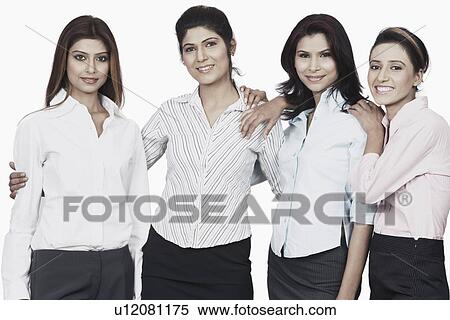 Portrait of four businesswomen smiling View Large Photo Image Stock Photography - Portrait of four businesswomen smiling. Fotosearch