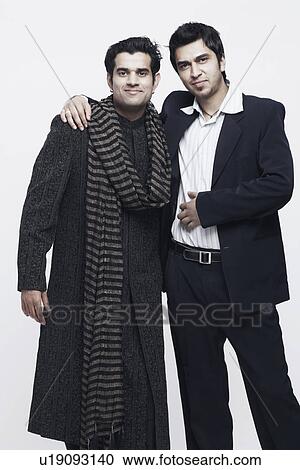 Portrait of two young men smiling View Large Photo Image Stock Image - Portrait of two young men smiling. Fotosearch