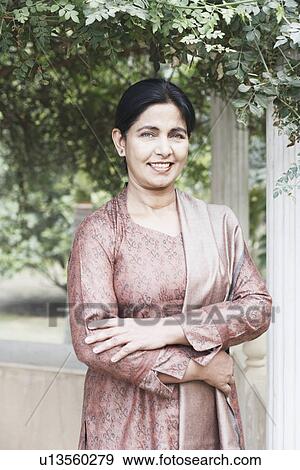 Stock Photo - Portrait of a mature woman smiling. Fotosearch