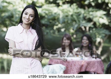 Stock Photo - Portrait of a teenage girl smiling. Fotosearch