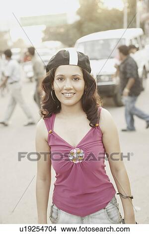 Picture - Portrait of a young woman smiling. Fotosearch