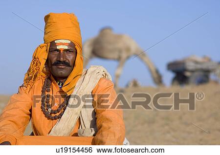 Portrait of a priest, Pushkar, Rajasthan, India View Large Photo Image Stock Photograph - Portrait of a priest, Pushkar, Rajasthan, India. Fotosearch