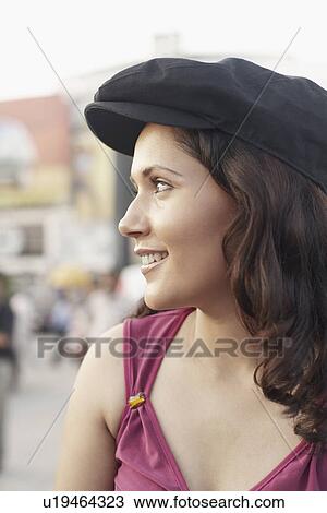 Stock Image - Close-up of a young woman smiling. Fotosearch