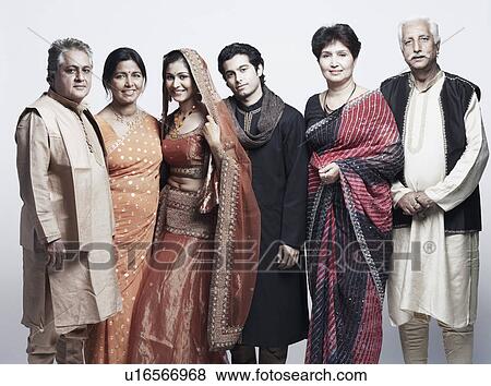 Stock Photo - Portrait of a family standing together. Fotosearch