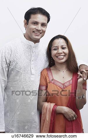 Portrait of a mid adult couple holding hands View Large Photo Image Stock Photo - Portrait of a mid adult couple holding hands. Fotosearch