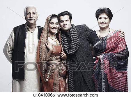 Stock Photography - Portrait of a newlywed couple with their parents. Fotosearch