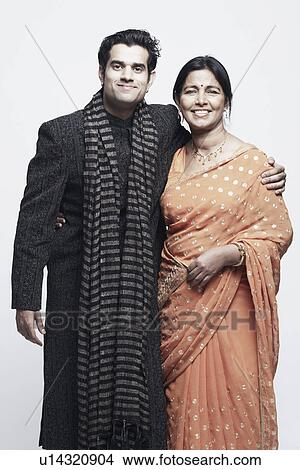 Picture - Portrait of a young man smiling with his mother. Fotosearch