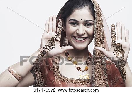 Close-up of a young woman with henna tattoo's on her hands View Large Photo Image Stock Image - Close-up of a young woman with henna tattoo's on her hands. Fotosearch