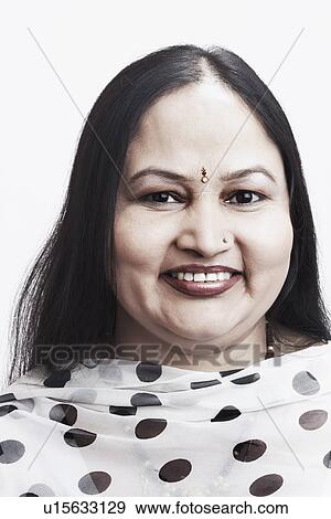 Stock Photo - Portrait of a mature woman smiling. Fotosearch