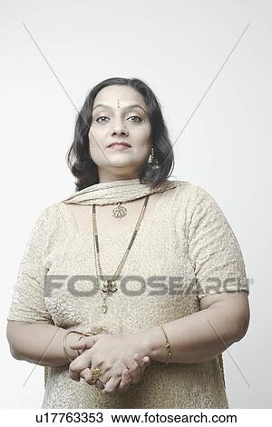 Portrait of a mature woman View Large Photo Image Stock Image - Portrait of a mature woman. Fotosearch