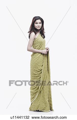 Stock Image - Portrait of a young woman smiling. Fotosearch