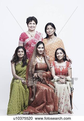 Stock Image - Portrait of two mothers with their daughters. Fotosearch
