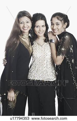 Portrait of three young women smiling View Large Photo Image Stock Image - Portrait of three young women smiling. Fotosearch