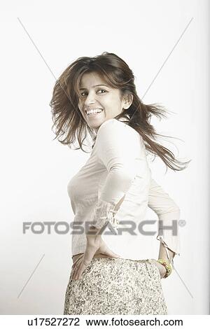 Stock Image - Young woman smiling. Fotosearch