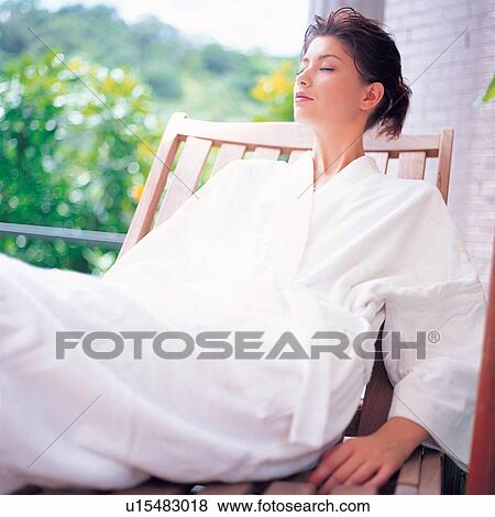 Stock Photo - Beauty Treatment, Hair Back, Close-Up, Three-Quarter Length, Indoor, Brown Hair, Getting Away From It All. Fotosearch