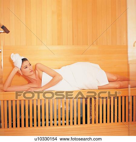Lifestyles, Beauty Treatment, Brown, One Young Woman Only, Towel, One Person View Large Photo Image Picture - Lifestyles, Beauty Treatment, Brown, One Young Woman Only, Towel, One Person. Fotosearch