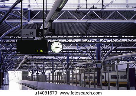 Railway station, Train, Trains, Platform, Platforms, Clock, Arrival View Large Photo Image Stock Photo - Railway station, Train, Trains, Platform, Platforms, Clock, Arrival. Fotosearch
