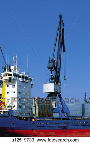 Stock Image - Transport, Transportation, Derrick, Blue, Sky, Harbour, Harbor. Fotosearch