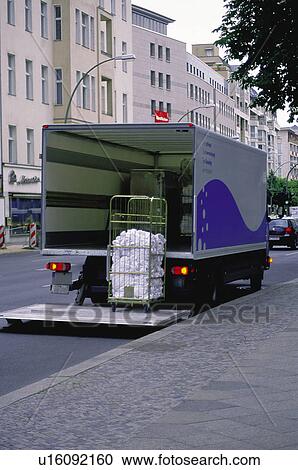 Stock Image - Transport, Transportation, Delivery van, Removal van, Moving van, Clothes, Package. Fotosearch