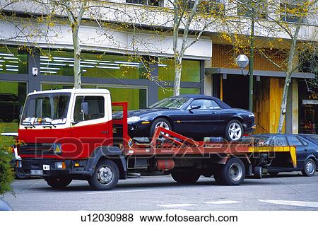 Transport, Transportation, Urban transport, Urban transportation, Tow truck, Towing vehicle, Breakdown View Large Photo Image Stock Photo - Transport, Transportation, Urban transport, Urban transportation, Tow truck, Towing vehicle, Breakdown. Fotosearch