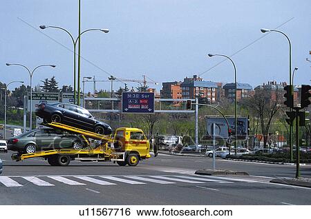 Stock Photograph - Transport, Transportation, Urban transport, Urban transportation, Tow truck, Towing vehicle, Breakdown. Fotosearch
