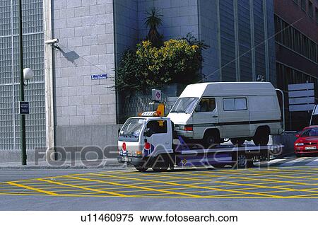 Stock Photography - Transport, Transportation, Urban transport, Urban transportation, Tow truck, Towing vehicle, Breakdown. Fotosearch