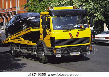 Transport, Transportation, Urban transport, Urban transportation, Tow truck, Towing vehicle, Breakdown View Large Photo Image Stock Photography - Transport, Transportation, Urban transport, Urban transportation, Tow truck, Towing vehicle, Breakdown. Fotosearch