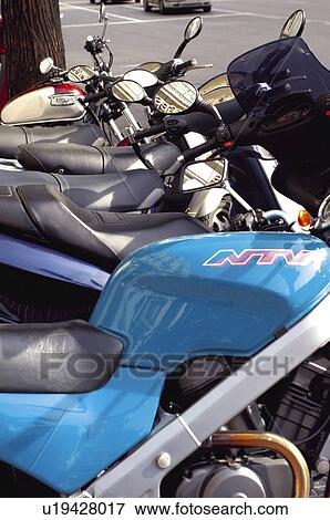 Stock Photo - Urban, Motorbike, Motorbikes, Parked, Driving mirror, Rear view mirror, Mirror. Fotosearch