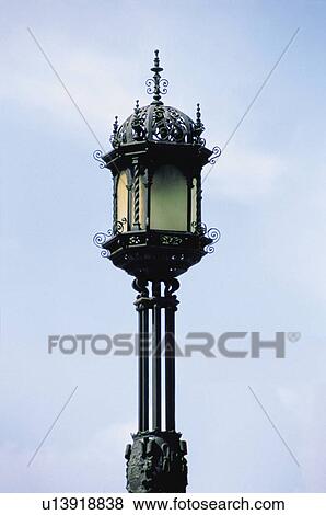 Stock Photo - Urban, Urban details, Light, Lamppost, Street light, Wrought iron, Iron. Fotosearch