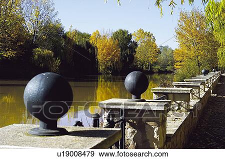 Stock Photo - Urban, Urban details, River, Wall, Bank, Tree, Trees. Fotosearch