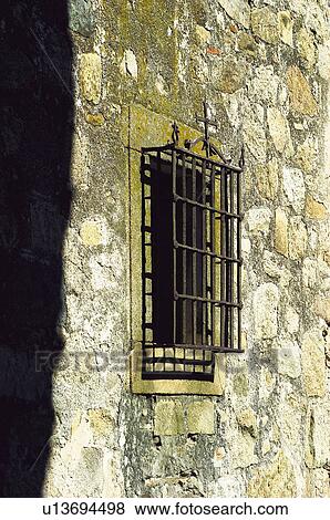 Stock Photo - Wall, Building, Window, Bars, Grille, Iron, Wrought iron. Fotosearch