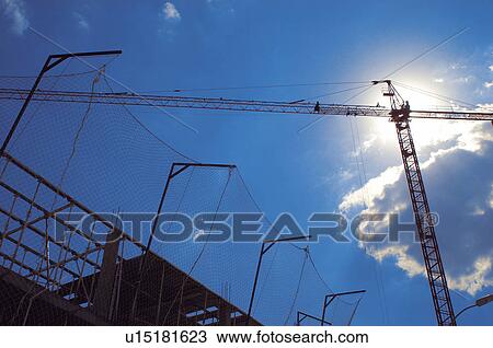 Stock Image - Construction, Building, Material, Crane, In construction, Building site, Construction site. Fotosearch