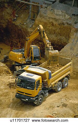 Stock Photo - Construction, Building, Material, Crane, In construction, Building site, Construction site. Fotosearch