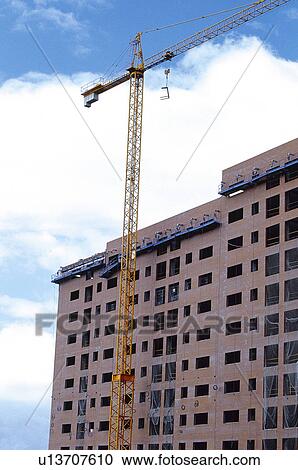 Construction, Material, Building, Buildings, Construction material, Crane, Raise View Large Photo Image Stock Image - Construction, Material, Building, Buildings, Construction material, Crane, Raise. Fotosearch