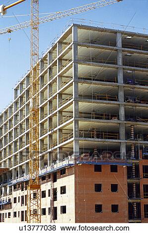 Stock Photo - Construction, Material, Building, Buildings, Construction material, Crane, Raise. Fotosearch