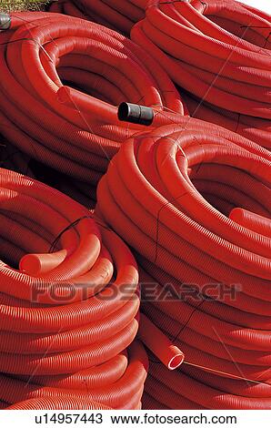 Construction, Material, Electricity, Tube, Red, Red tube, Coiled View Large Photo Image Stock Image - Construction, Material, Electricity, Tube, Red, Red tube, Coiled. Fotosearch