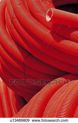 Construction, Material, Electricity, Tube, Red, Red tube, Coiled View Large Photo Image Stock Photo - Construction, Material, Electricity, Tube, Red, Red tube, Coiled. Fotosearch