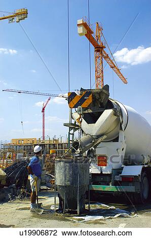 Stock Image - Construction, Worker, Labourer, Laborer, Helmet, Concrete. Fotosearch