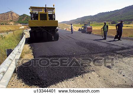 Stock Image - Construction, Worker, Workers, Asphalt, Blacktop, Asphalting, Road. Fotosearch