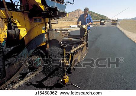 Stock Image - Construction, Worker, Workers, Asphalt, Blacktop, Asphalting, Road. Fotosearch