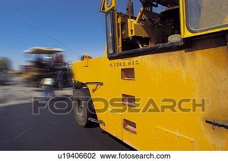 Stock Image - Construction, Worker, Workers, Asphalt, Blacktop, Asphalting, Road. Fotosearch