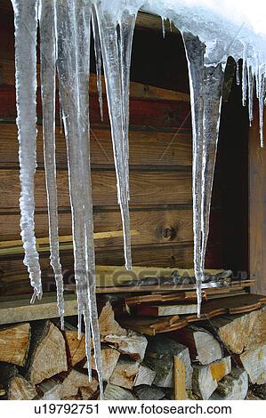 Stock Image - Snow, Snowy, Winter, Snow details, Roof, House, Icicle. Fotosearch