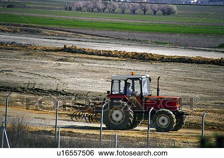 Agricultural, Plantation, Transportation, Transport, Land, Machinery, Agriculture View Large Photo Image Stock Photograph - Agricultural, Plantation, Transportation, Transport, Land, Machinery, Agriculture. Fotosearch