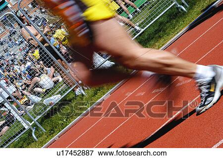 Stock Photo -  Sport, Sports, Sportsman, Sport clothes, Racetrack. Fotosearch