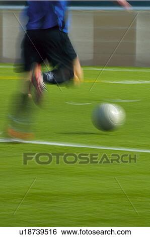 Stock Photograph -  Sport, Sports, Sportsman, Sport clothes, Football. Fotosearch