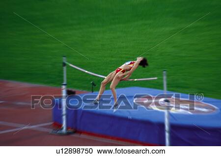 Stock Image -  Sport, Sports, Sportswoman, Woman, Sport clothes, Jump. Fotosearch
