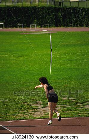 Stock Image -  Sport, Sports, Sportswoman, Woman, Sport clothes, Throw. Fotosearch