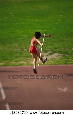 Stock Photo -  Sport, Sports, Sportswoman, Woman, Sport clothes, Throw. Fotosearch