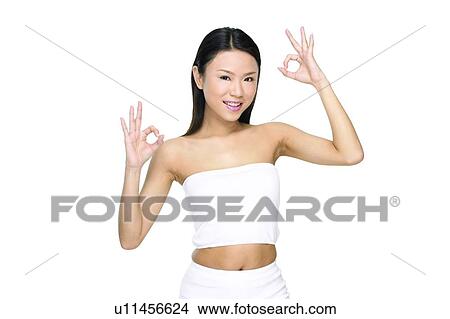 Picture - Asian Ethnicity, Close-Up, Black Hair, Belly Button, Agreement. Fotosearch