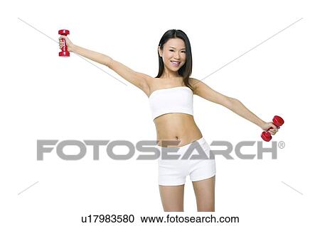 Stock Image - Asian Ethnicity, Close-Up, Black Hair, Belly Button, Arm Outstretched. Fotosearch